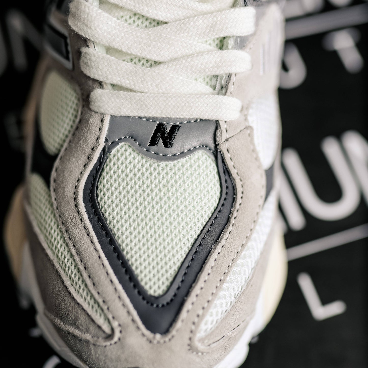 New Balance 9060 Grey logo