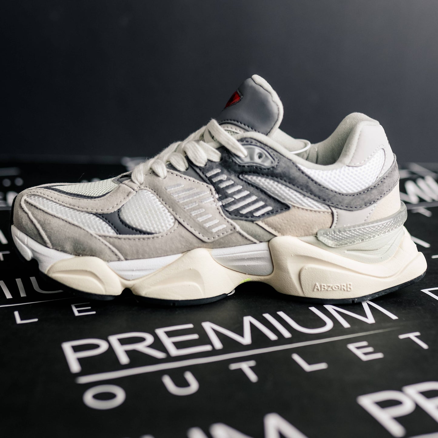 New Balance 9060 Grey logo